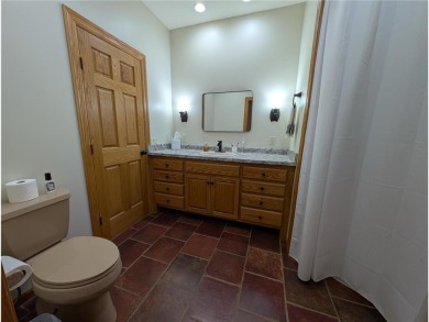 Stunning 4-bedroom, 3-bathroom home offering nearly 5,000 sq ft on Zumbrota Golf Club in Minnesota - for sale on GolfHomes.com, golf home, golf lot