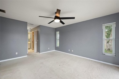 Three Bedroom, Two Bath, attached Two Car Garage Home located on on Deep Creek Golf Club in Florida - for sale on GolfHomes.com, golf home, golf lot