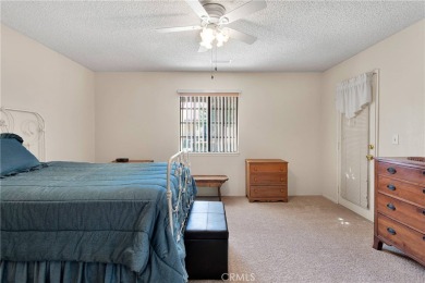 This charming home is in the highly sought-after gated community on Ashwood Golf Course in California - for sale on GolfHomes.com, golf home, golf lot