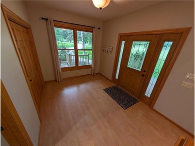 Stunning 4-bedroom, 3-bathroom home offering nearly 5,000 sq ft on Zumbrota Golf Club in Minnesota - for sale on GolfHomes.com, golf home, golf lot