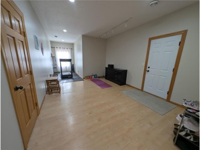 Stunning 4-bedroom, 3-bathroom home offering nearly 5,000 sq ft on Zumbrota Golf Club in Minnesota - for sale on GolfHomes.com, golf home, golf lot