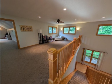 Stunning 4-bedroom, 3-bathroom home offering nearly 5,000 sq ft on Zumbrota Golf Club in Minnesota - for sale on GolfHomes.com, golf home, golf lot