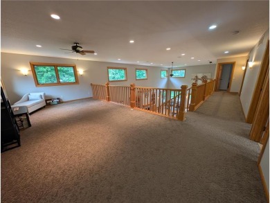 Stunning 4-bedroom, 3-bathroom home offering nearly 5,000 sq ft on Zumbrota Golf Club in Minnesota - for sale on GolfHomes.com, golf home, golf lot