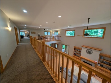 Stunning 4-bedroom, 3-bathroom home offering nearly 5,000 sq ft on Zumbrota Golf Club in Minnesota - for sale on GolfHomes.com, golf home, golf lot