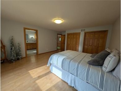 Stunning 4-bedroom, 3-bathroom home offering nearly 5,000 sq ft on Zumbrota Golf Club in Minnesota - for sale on GolfHomes.com, golf home, golf lot