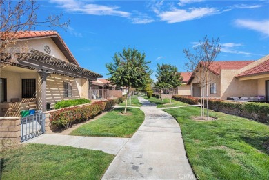 This charming home is in the highly sought-after gated community on Ashwood Golf Course in California - for sale on GolfHomes.com, golf home, golf lot