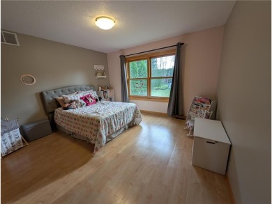 Stunning 4-bedroom, 3-bathroom home offering nearly 5,000 sq ft on Zumbrota Golf Club in Minnesota - for sale on GolfHomes.com, golf home, golf lot