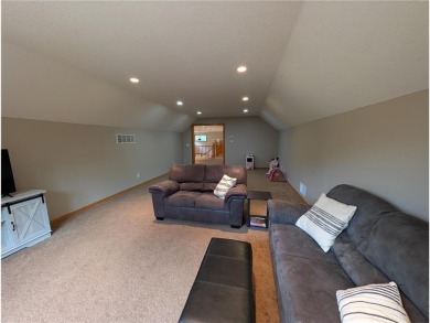 Stunning 4-bedroom, 3-bathroom home offering nearly 5,000 sq ft on Zumbrota Golf Club in Minnesota - for sale on GolfHomes.com, golf home, golf lot