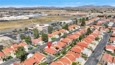 This charming home is in the highly sought-after gated community on Ashwood Golf Course in California - for sale on GolfHomes.com, golf home, golf lot