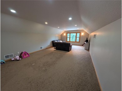 Stunning 4-bedroom, 3-bathroom home offering nearly 5,000 sq ft on Zumbrota Golf Club in Minnesota - for sale on GolfHomes.com, golf home, golf lot