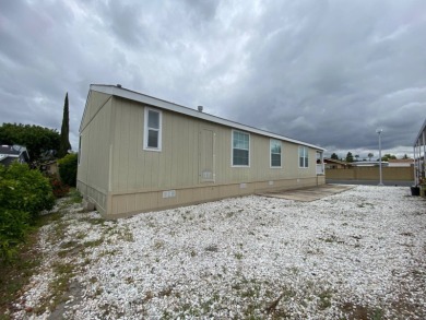 This 2009, 1325sf manufacture home was first sold in 2011. This on Carlton Oaks Country Club in California - for sale on GolfHomes.com, golf home, golf lot