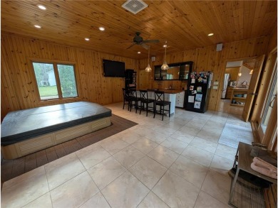 Stunning 4-bedroom, 3-bathroom home offering nearly 5,000 sq ft on Zumbrota Golf Club in Minnesota - for sale on GolfHomes.com, golf home, golf lot