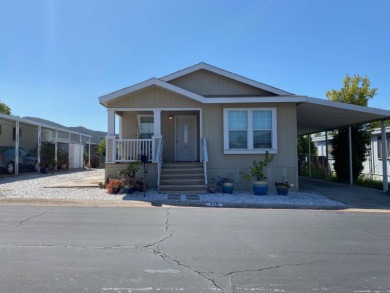 This 2009, 1325sf manufacture home was first sold in 2011. This on Carlton Oaks Country Club in California - for sale on GolfHomes.com, golf home, golf lot