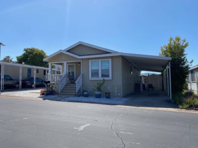This 2009, 1325sf manufacture home was first sold in 2011. This on Carlton Oaks Country Club in California - for sale on GolfHomes.com, golf home, golf lot