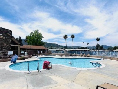 This 2009, 1325sf manufacture home was first sold in 2011. This on Carlton Oaks Country Club in California - for sale on GolfHomes.com, golf home, golf lot