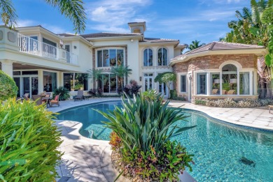 Custom built, luxury estate home with lake and golf course views on Mizner Country Club in Florida - for sale on GolfHomes.com, golf home, golf lot