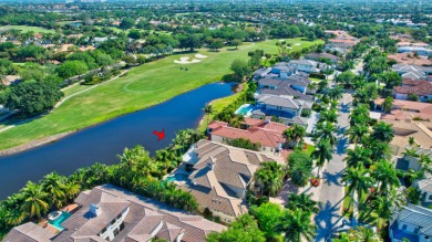 Custom built, luxury estate home with lake and golf course views on Mizner Country Club in Florida - for sale on GolfHomes.com, golf home, golf lot