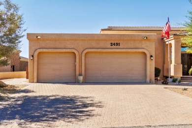 This Residential Estates home is directly on the 3rd fairway on London Bridge Golf Course in Arizona - for sale on GolfHomes.com, golf home, golf lot