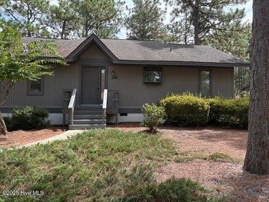 This two-bedroom townhome is located on the 12th hole of on Pinehurst  No. 6 Golf Course in North Carolina - for sale on GolfHomes.com, golf home, golf lot