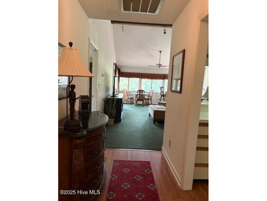 This two-bedroom townhome is located on the 12th hole of on Pinehurst  No. 6 Golf Course in North Carolina - for sale on GolfHomes.com, golf home, golf lot
