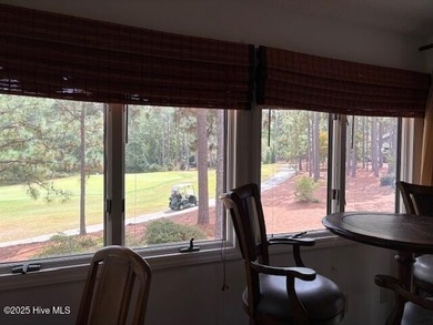 This two-bedroom townhome is located on the 12th hole of on Pinehurst  No. 6 Golf Course in North Carolina - for sale on GolfHomes.com, golf home, golf lot