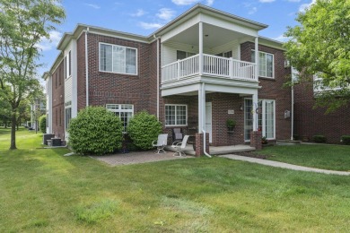 Discover your dream ranch condo on the Glacier Bay Golf course on The Glacier Club in Michigan - for sale on GolfHomes.com, golf home, golf lot