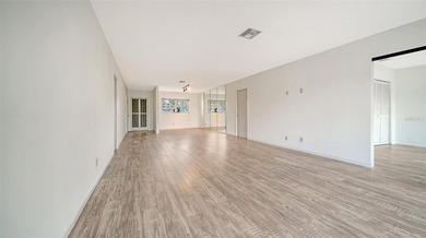 Rarely available and generously proportioned, this three-bedroom on Palm Aire Country Club of Sarasota in Florida - for sale on GolfHomes.com, golf home, golf lot