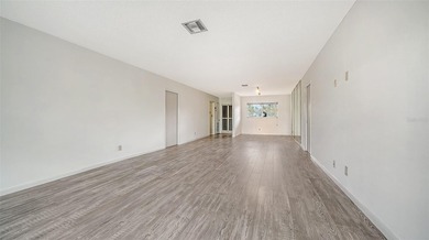 Rarely available and generously proportioned, this three-bedroom on Palm Aire Country Club of Sarasota in Florida - for sale on GolfHomes.com, golf home, golf lot