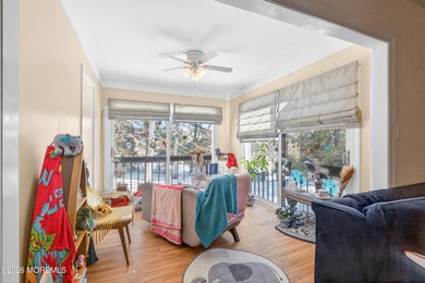 Quiet, private second-floor Navesink model set among the trees on Shadow Lake Village in New Jersey - for sale on GolfHomes.com, golf home, golf lot