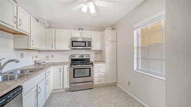 Rarely available and generously proportioned, this three-bedroom on Palm Aire Country Club of Sarasota in Florida - for sale on GolfHomes.com, golf home, golf lot