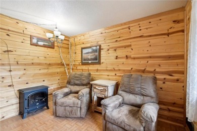 Welcome to a one-of-a-kind haven that effortlessly blends rustic on Birnamwood Golf Course in Minnesota - for sale on GolfHomes.com, golf home, golf lot