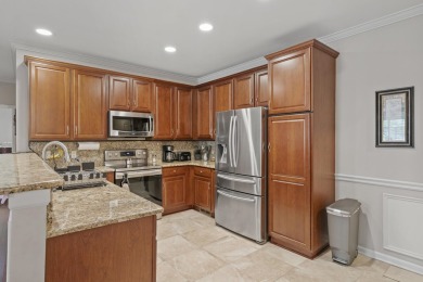 Discover your dream ranch condo on the Glacier Bay Golf course on The Glacier Club in Michigan - for sale on GolfHomes.com, golf home, golf lot
