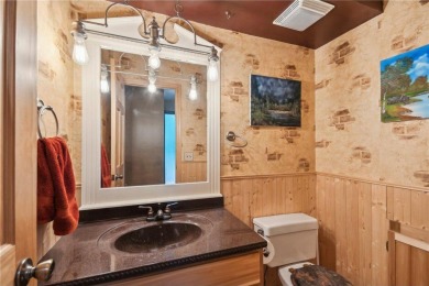 Welcome to a one-of-a-kind haven that effortlessly blends rustic on Birnamwood Golf Course in Minnesota - for sale on GolfHomes.com, golf home, golf lot