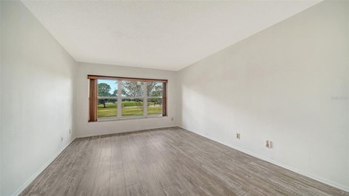 Rarely available and generously proportioned, this three-bedroom on Palm Aire Country Club of Sarasota in Florida - for sale on GolfHomes.com, golf home, golf lot