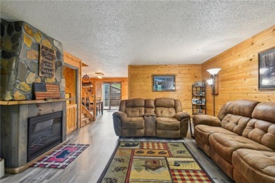 Welcome to a one-of-a-kind haven that effortlessly blends rustic on Birnamwood Golf Course in Minnesota - for sale on GolfHomes.com, golf home, golf lot