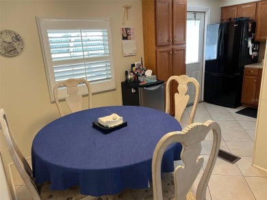 Step into the epitome of easy living in the heart of the popular on Palm Hill Golf Club in Florida - for sale on GolfHomes.com, golf home, golf lot