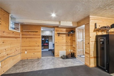 Welcome to a one-of-a-kind haven that effortlessly blends rustic on Birnamwood Golf Course in Minnesota - for sale on GolfHomes.com, golf home, golf lot