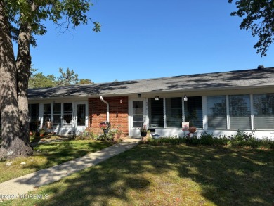 Completely updated ETON model with a highly desirable sun porch on Greenbriar Woodlands in New Jersey - for sale on GolfHomes.com, golf home, golf lot