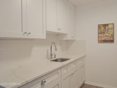 Completely updated ETON model with a highly desirable sun porch on Greenbriar Woodlands in New Jersey - for sale on GolfHomes.com, golf home, golf lot