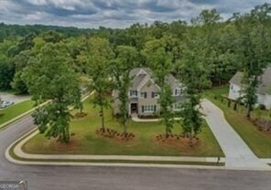 Welcome to refined living in one of Monroe's most charming and on Monroe Golf and Country Club in Georgia - for sale on GolfHomes.com, golf home, golf lot