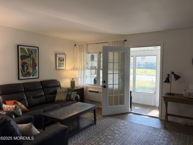 Completely updated ETON model with a highly desirable sun porch on Greenbriar Woodlands in New Jersey - for sale on GolfHomes.com, golf home, golf lot