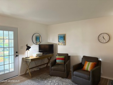 Completely updated ETON model with a highly desirable sun porch on Greenbriar Woodlands in New Jersey - for sale on GolfHomes.com, golf home, golf lot