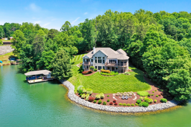 Gorgeous waterfront home on point lot with 10+ acres and 1,000+ on Mariners Landing Golf and Country Club in Virginia - for sale on GolfHomes.com, golf home, golf lot