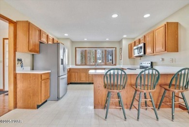 Stunning Cedar Chalet on the 15th Fairway of Paupack Hills in on Paupack Hills Golf and Country Club in Pennsylvania - for sale on GolfHomes.com, golf home, golf lot