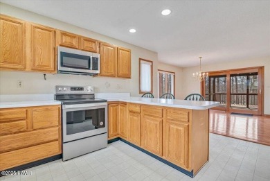 Stunning Cedar Chalet on the 15th Fairway of Paupack Hills in on Paupack Hills Golf and Country Club in Pennsylvania - for sale on GolfHomes.com, golf home, golf lot