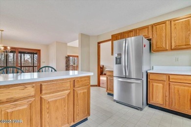 Stunning Cedar Chalet on the 15th Fairway of Paupack Hills in on Paupack Hills Golf and Country Club in Pennsylvania - for sale on GolfHomes.com, golf home, golf lot