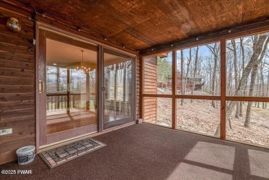Stunning Cedar Chalet on the 15th Fairway of Paupack Hills in on Paupack Hills Golf and Country Club in Pennsylvania - for sale on GolfHomes.com, golf home, golf lot