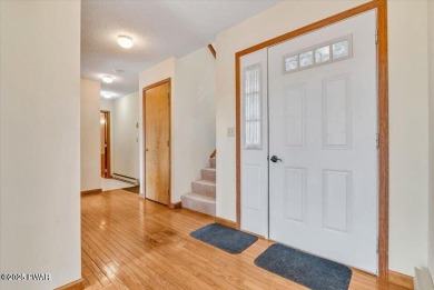 Stunning Cedar Chalet on the 15th Fairway of Paupack Hills in on Paupack Hills Golf and Country Club in Pennsylvania - for sale on GolfHomes.com, golf home, golf lot