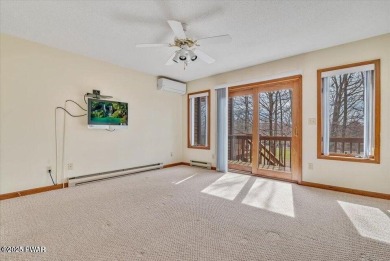 Stunning Cedar Chalet on the 15th Fairway of Paupack Hills in on Paupack Hills Golf and Country Club in Pennsylvania - for sale on GolfHomes.com, golf home, golf lot