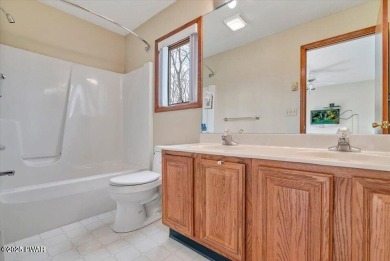 Stunning Cedar Chalet on the 15th Fairway of Paupack Hills in on Paupack Hills Golf and Country Club in Pennsylvania - for sale on GolfHomes.com, golf home, golf lot